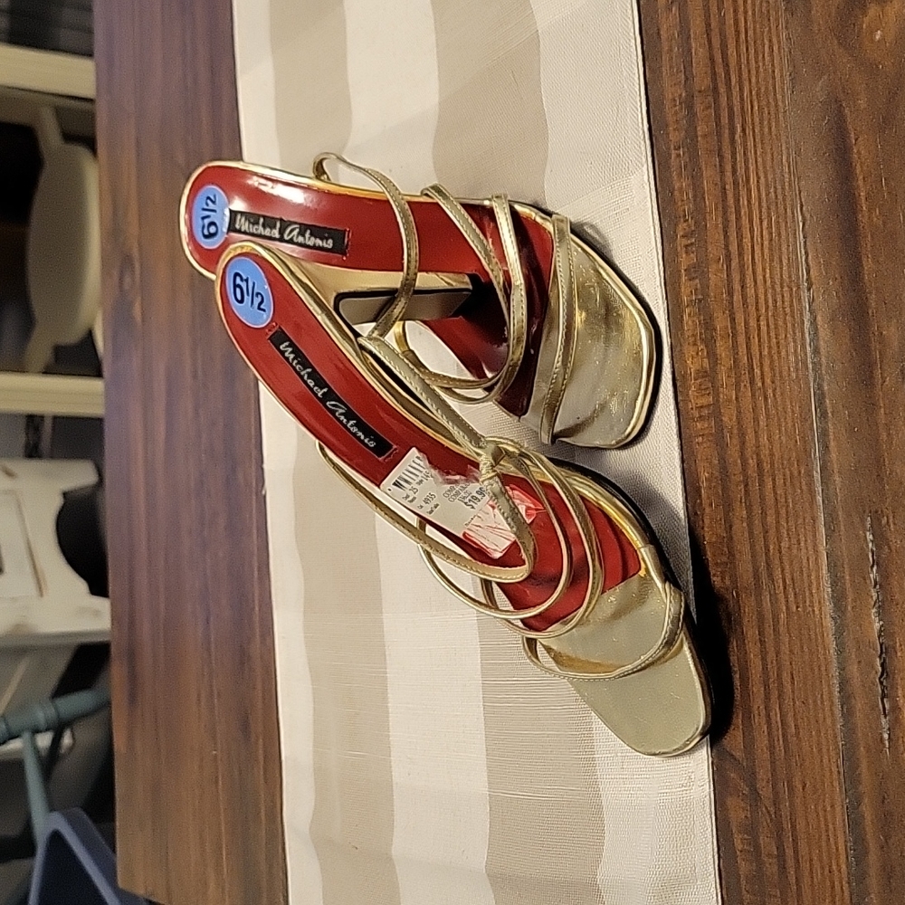 Michael Antonio gold striped heel